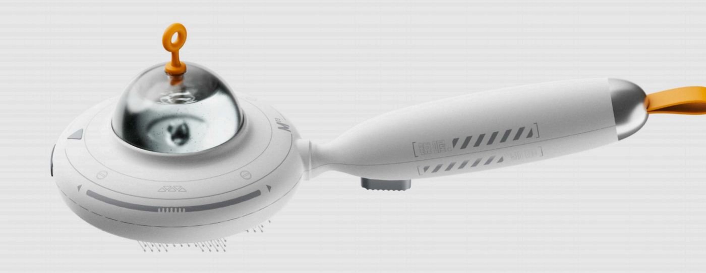 A white pet grooming brush with a misting dome