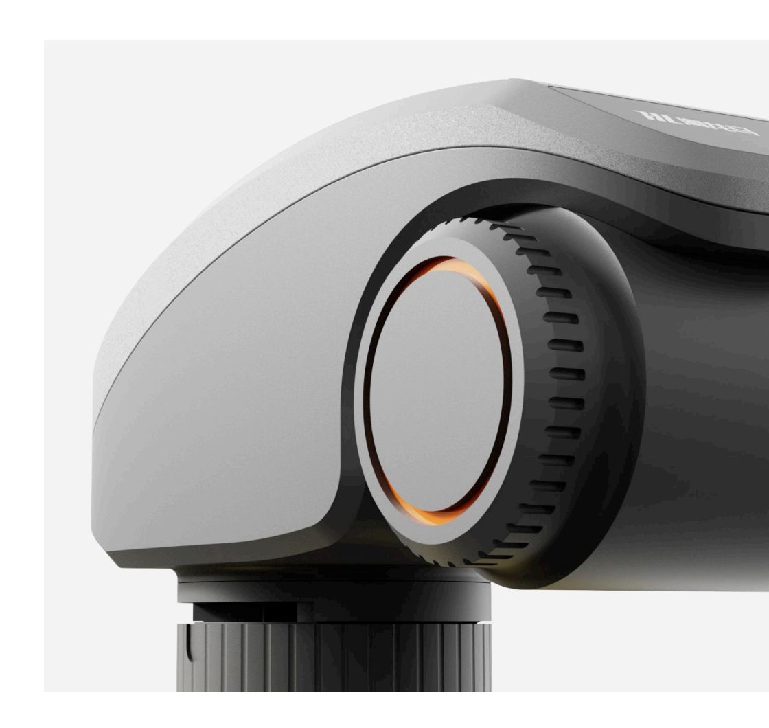 Close-up render of a smart heating control valve with an orange ring dial