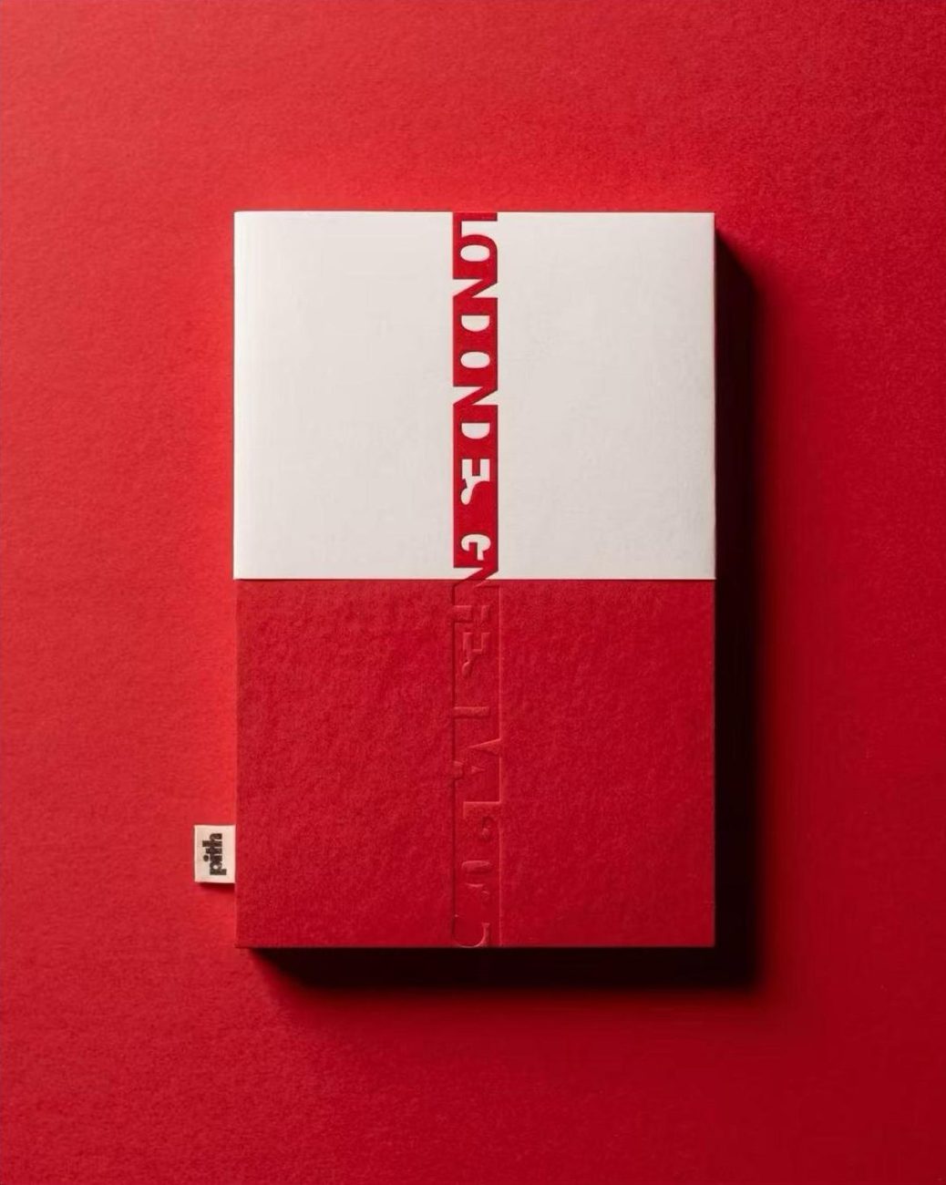 The presentation box shown flat, with its red and white colour blocks.
